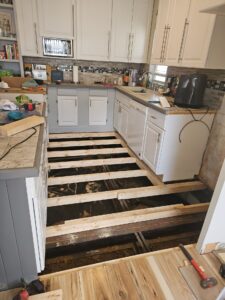 Damaged Flooring being repaired in Mobile Home